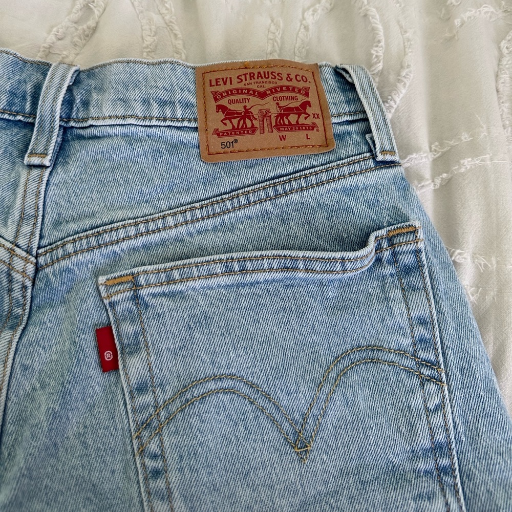 Light washed Levi 501’ shorts, waist 25
